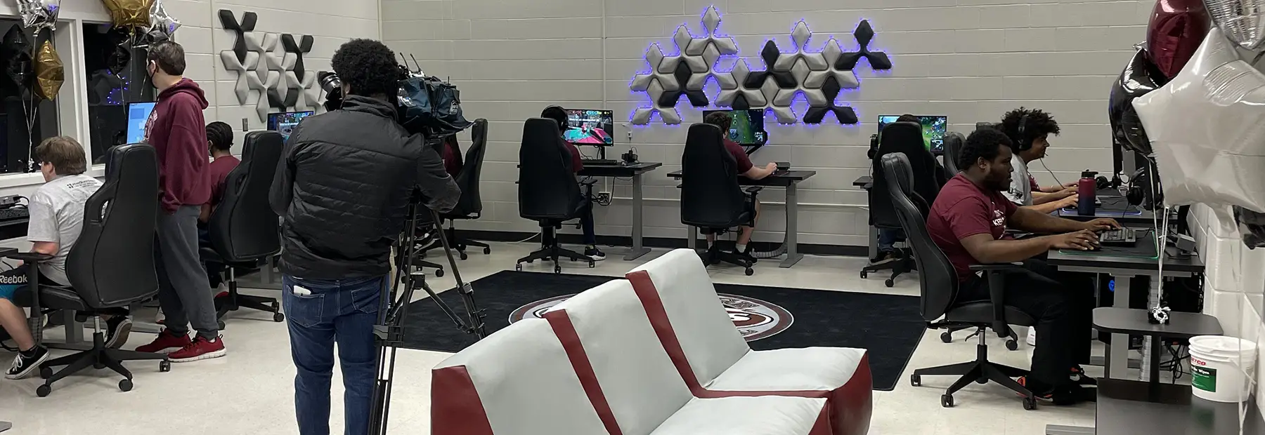Gaming center room with students